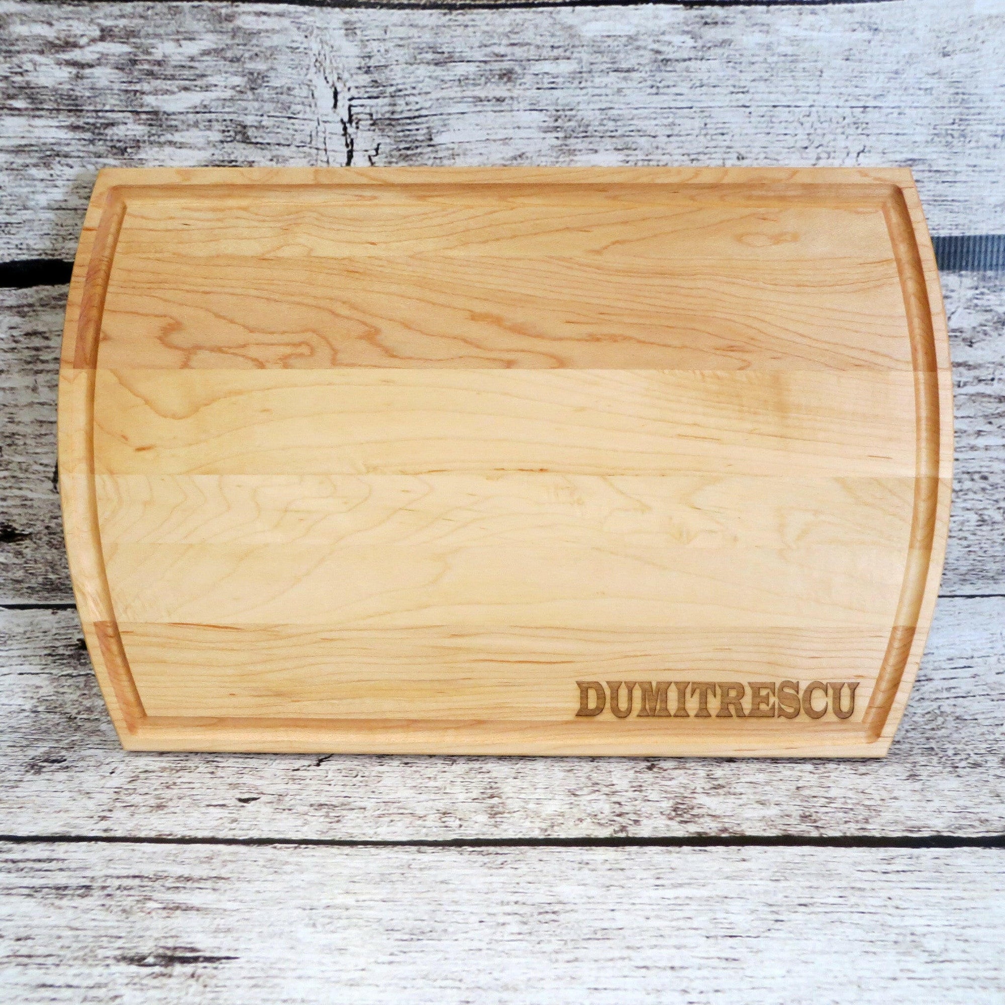 Simplistic Last Name Cutting Board.