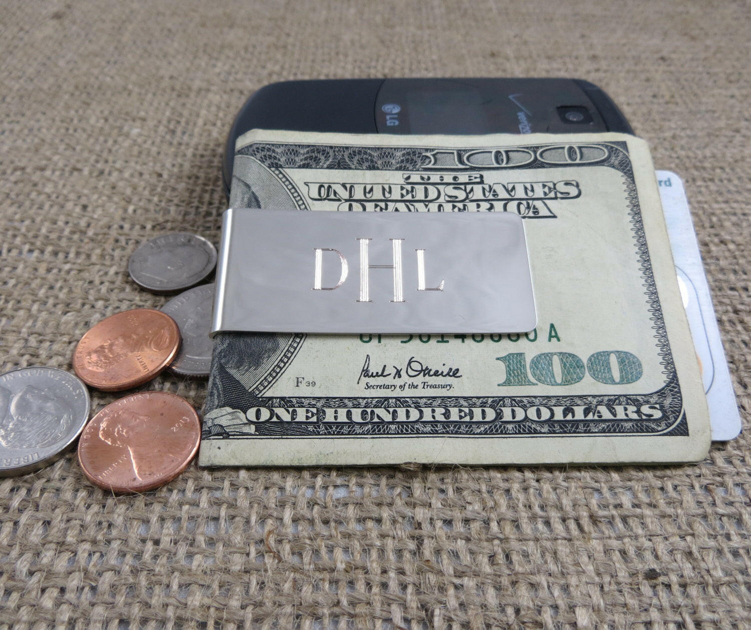 Silver toned Money Clip.