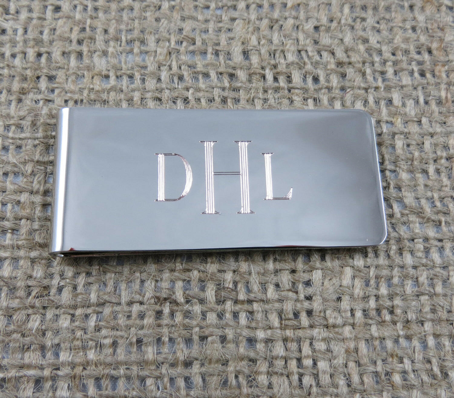 Silver toned Money Clip.