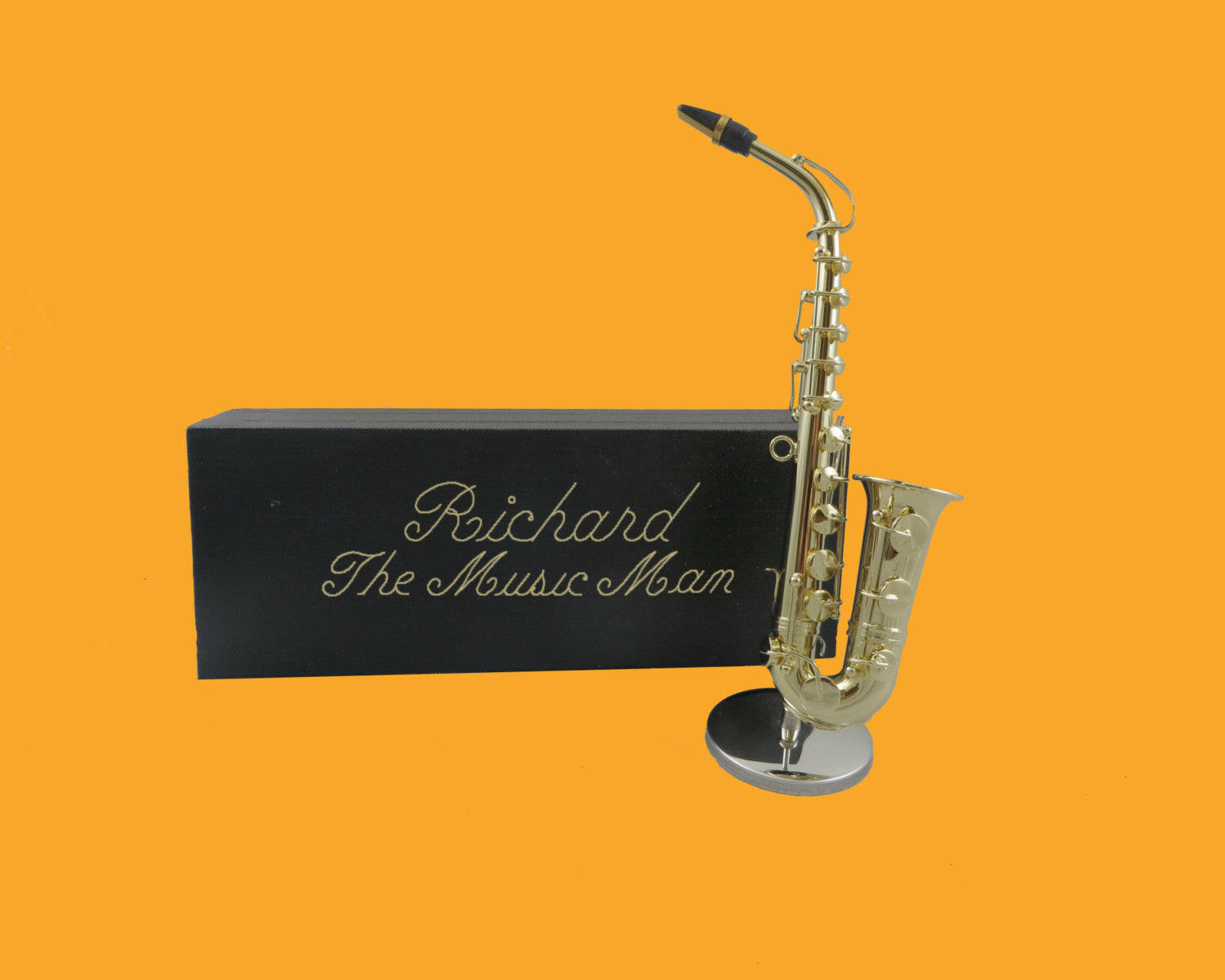 Embossed Miniature Saxophone.
