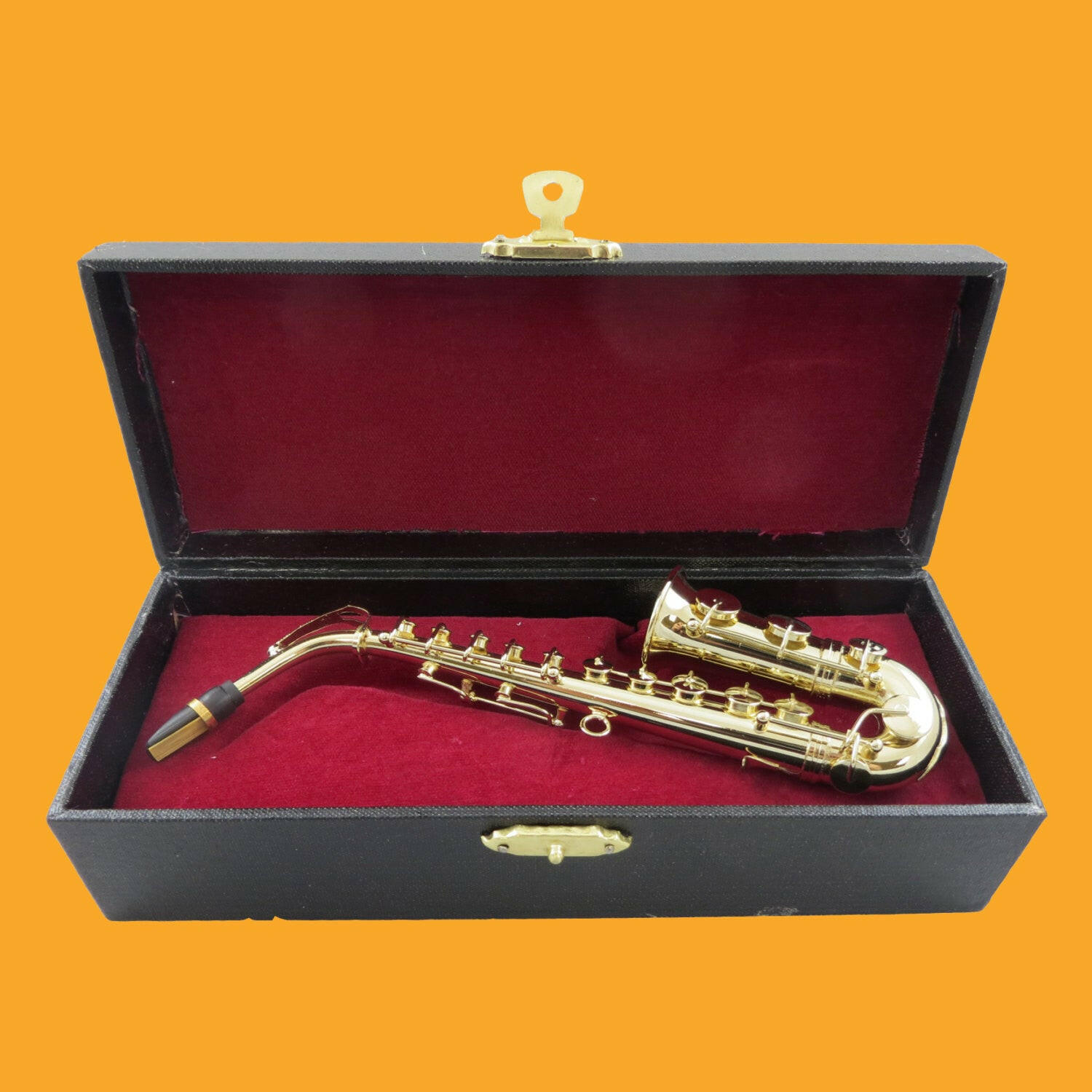 Embossed Miniature Saxophone.