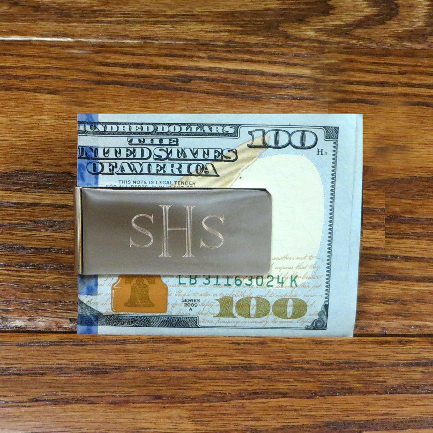 Silver toned Money Clip.