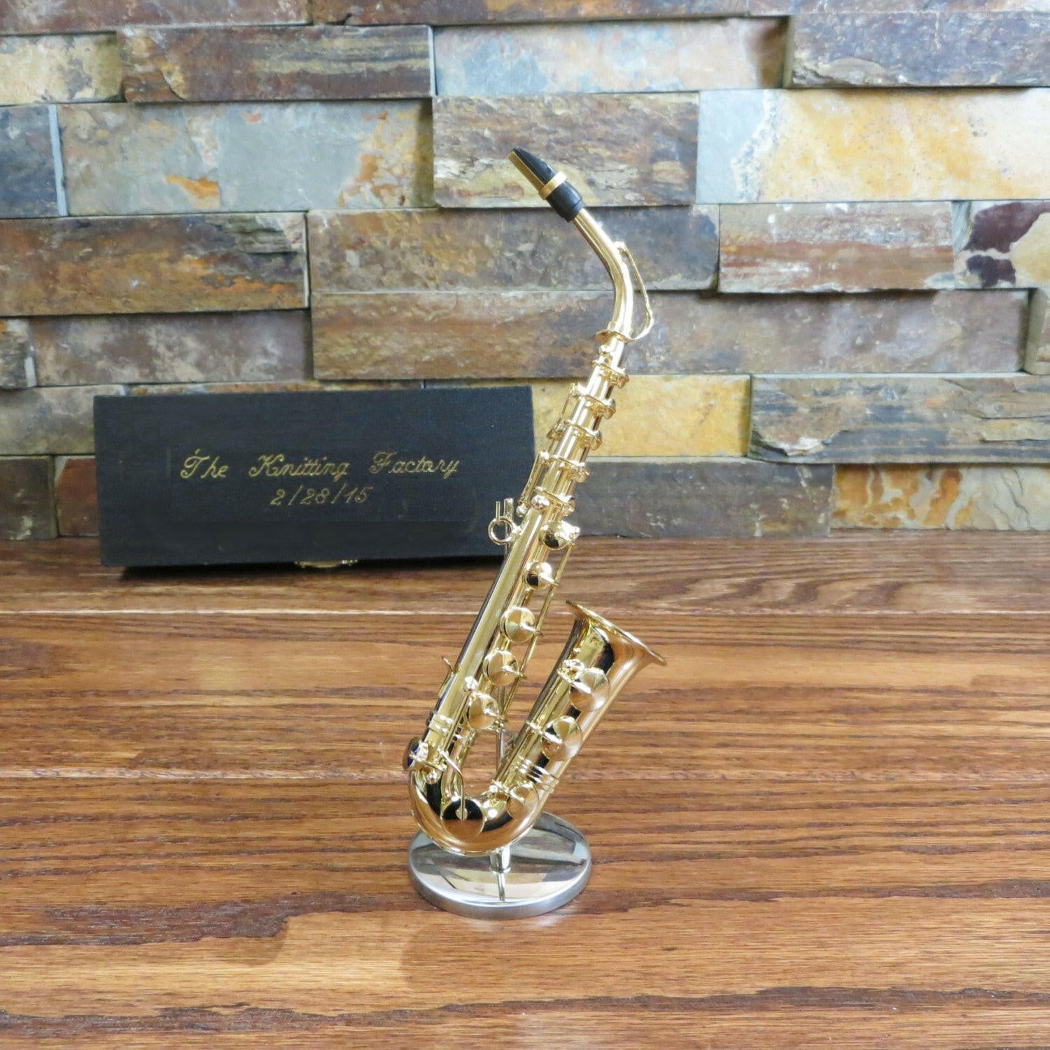 Embossed Miniature Saxophone.
