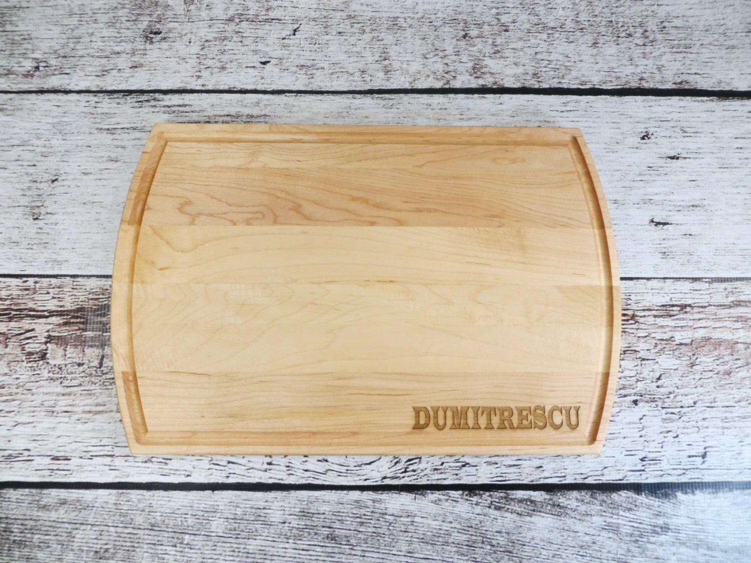 Simplistic Last Name Cutting Board.